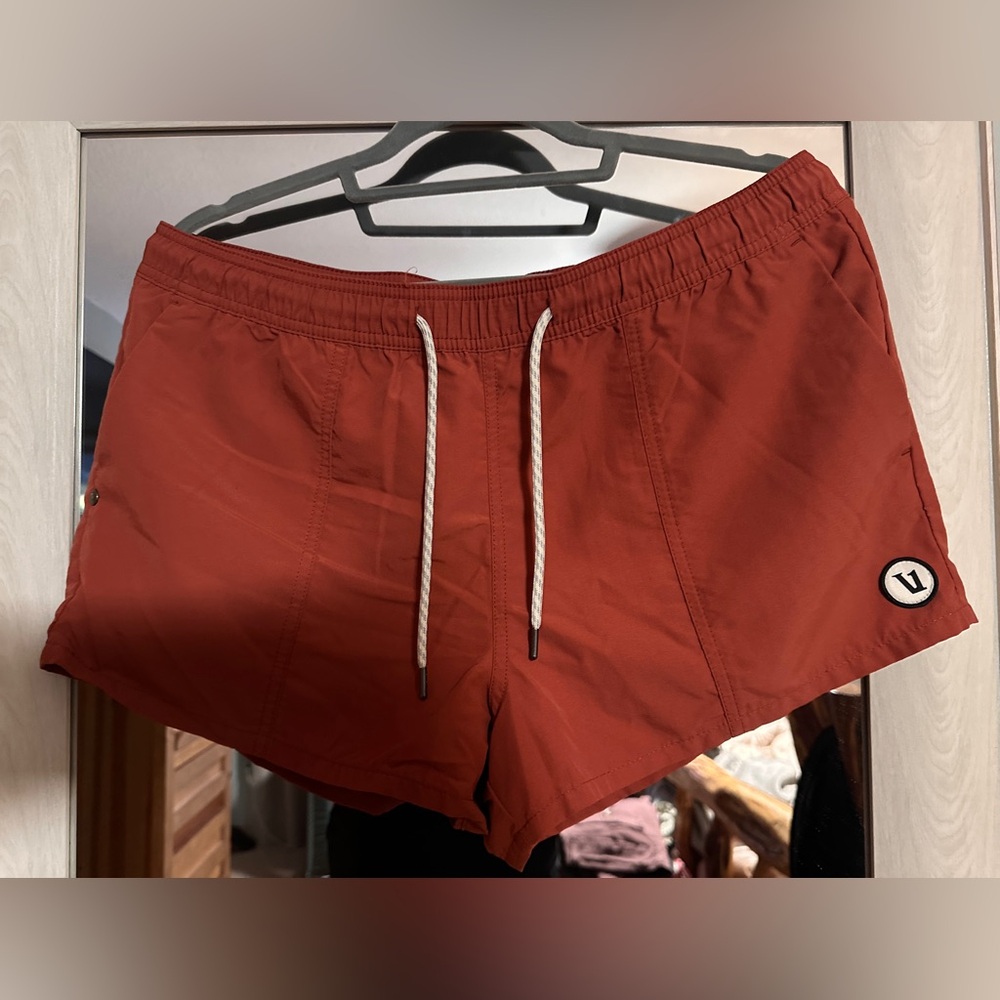Vuori Women's Shorts in Rust Red